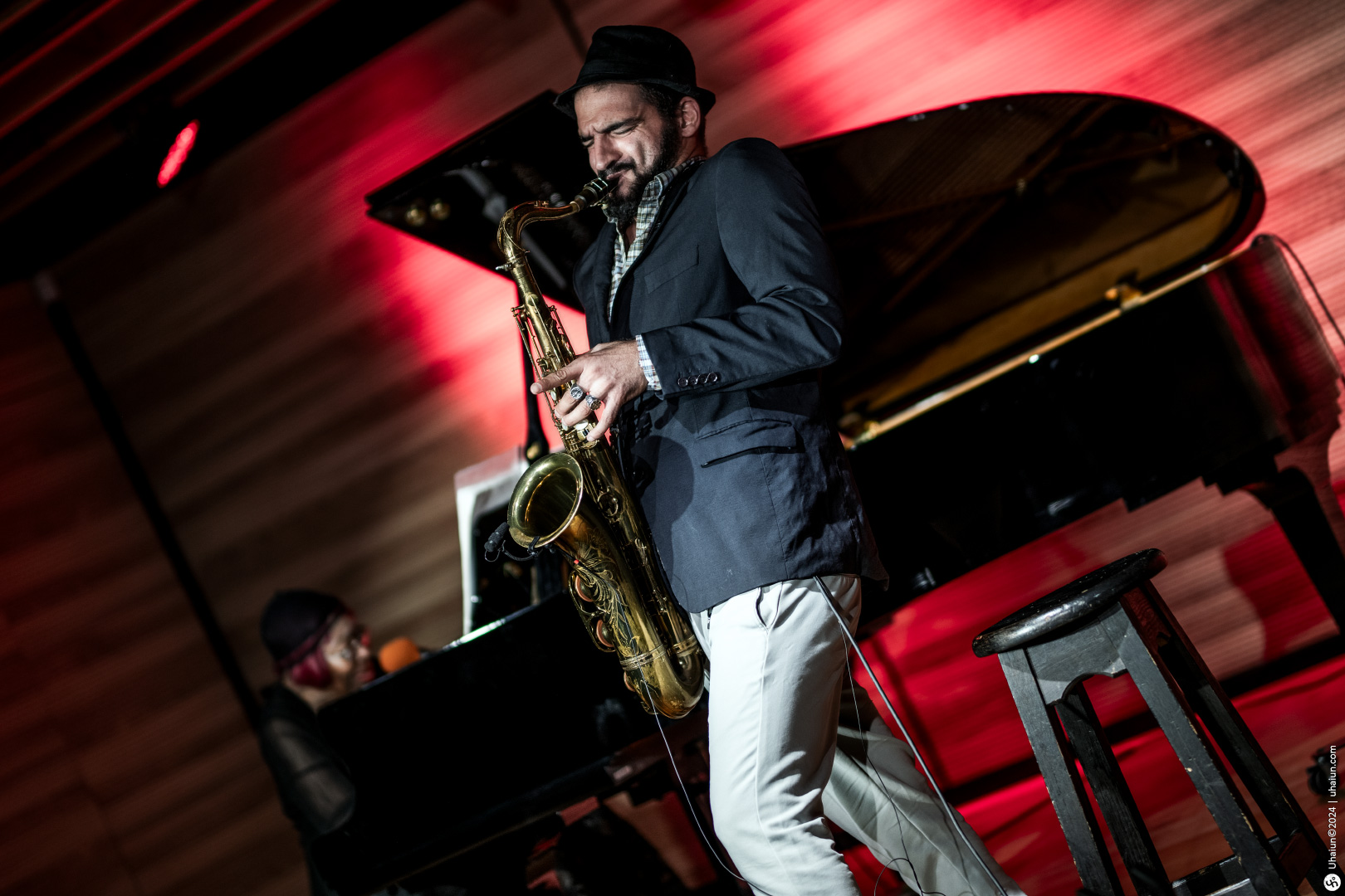 Koby Shem Tov playing saxophone on stage