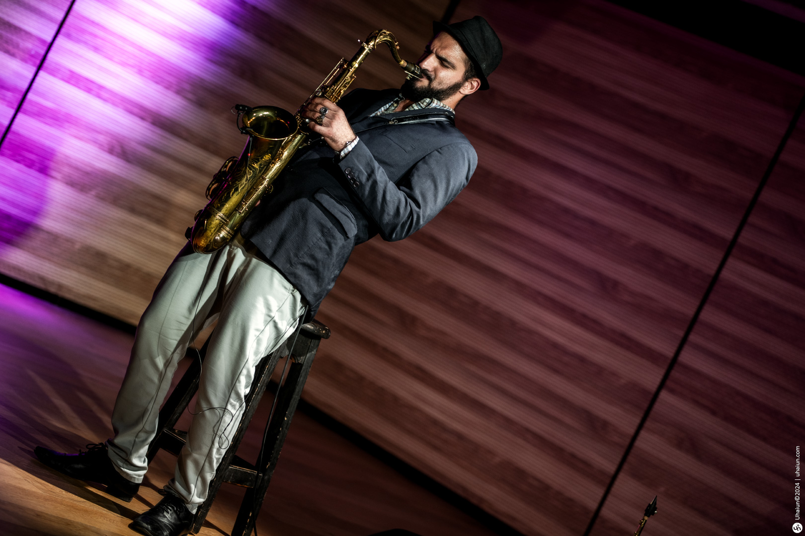 Koby Shem Tov playing saxophone on stage