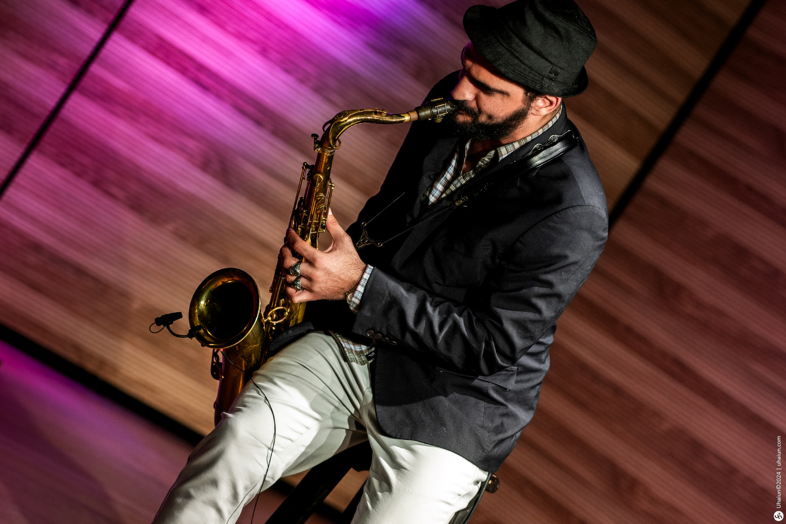 Koby Shem Tov playing saxophone on stage