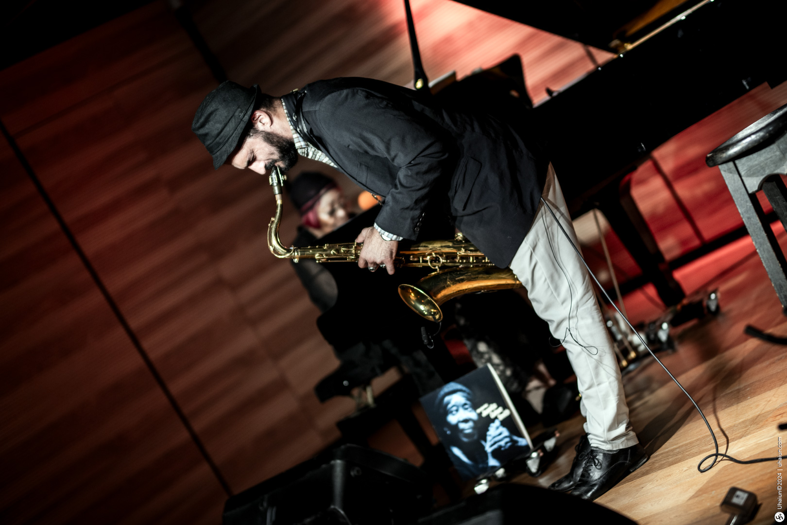 Koby Shem Tov playing saxophone on stage