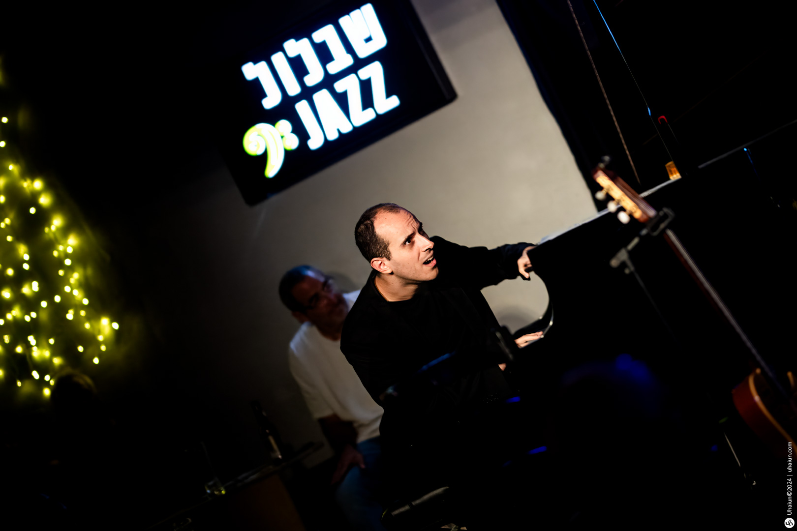 Concert pianist performing live on jazz stage