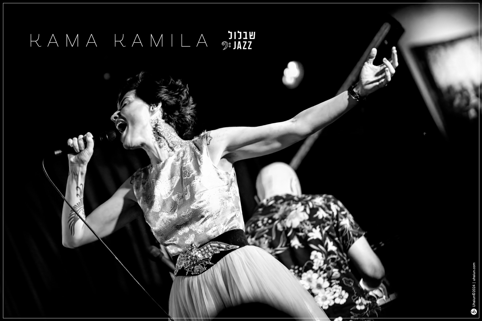 Kama Kamila jazz singer performing on stage