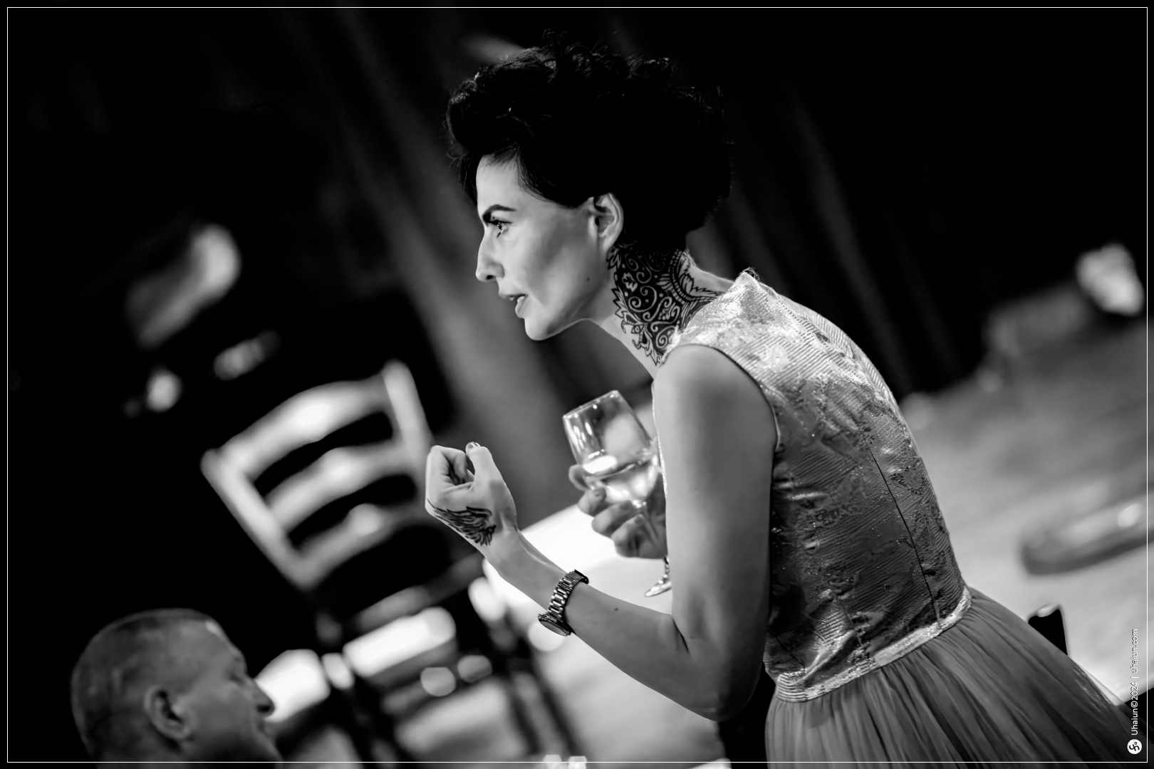 Elegant Kama Kamila at a sophisticated black and white event