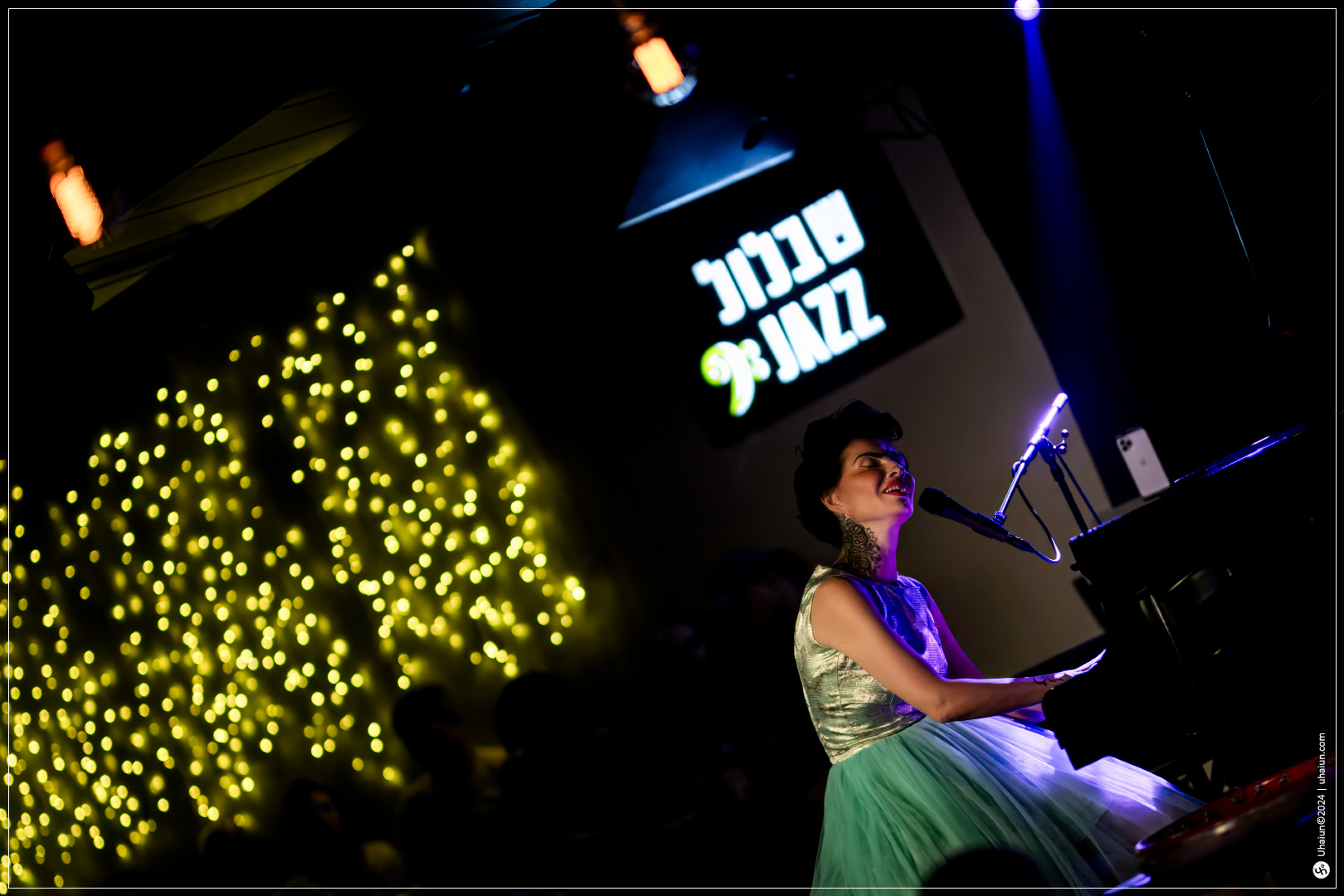 Kama Kamila performing piano at jazz club event