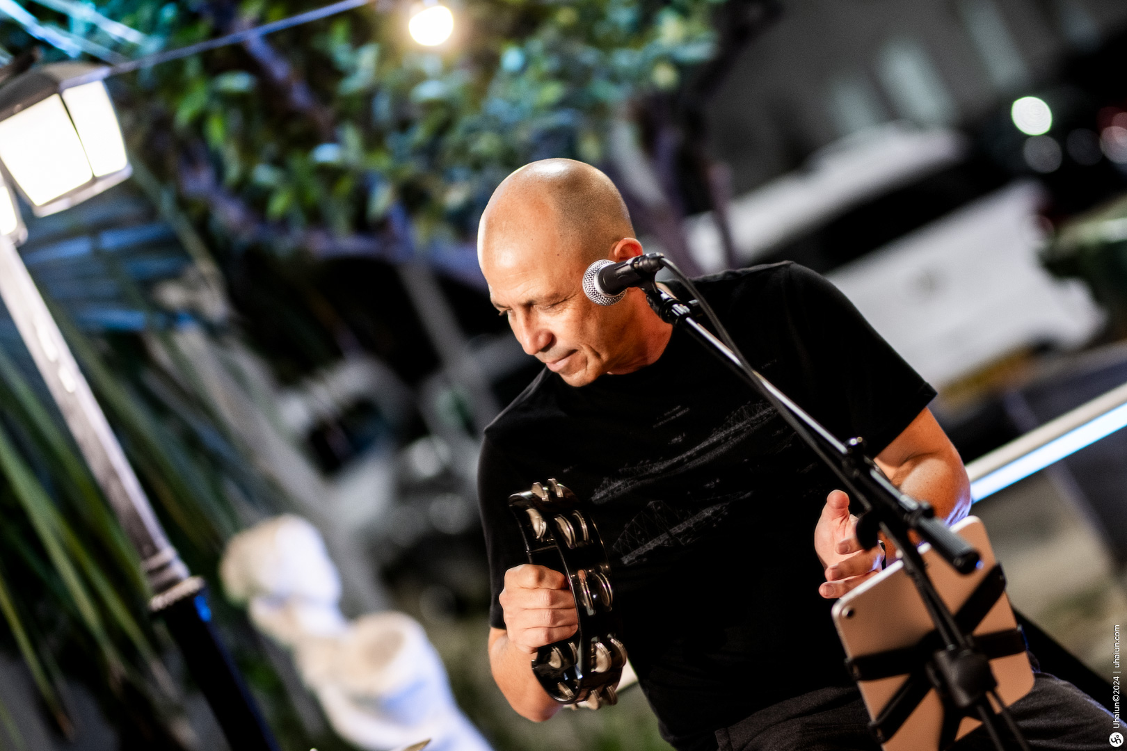 Musician singing at night
