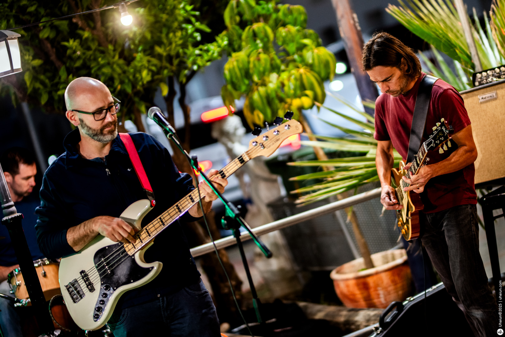 Musicians performing live at an outdoor concert