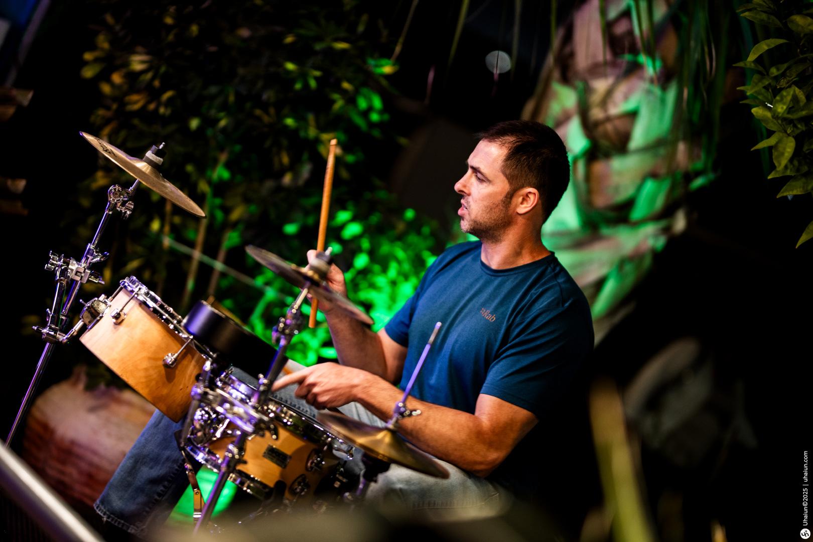 Man playing drums at outdoor music event