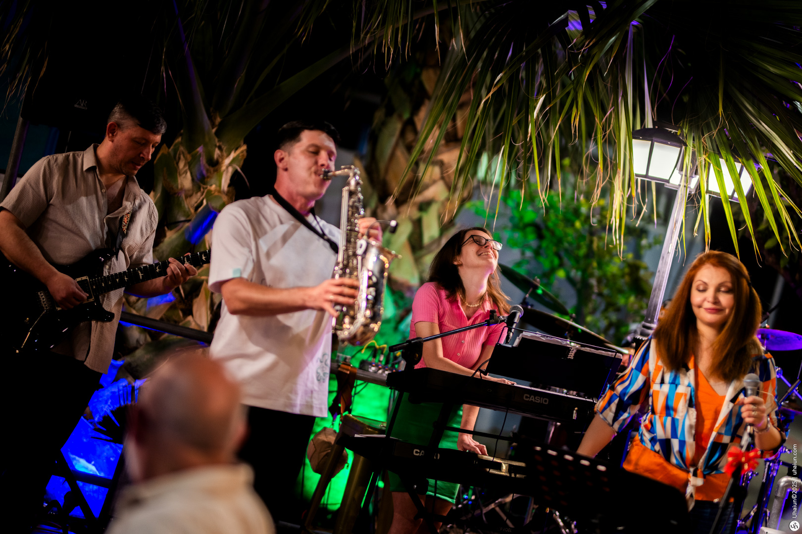 Live band performing at outdoor night event
