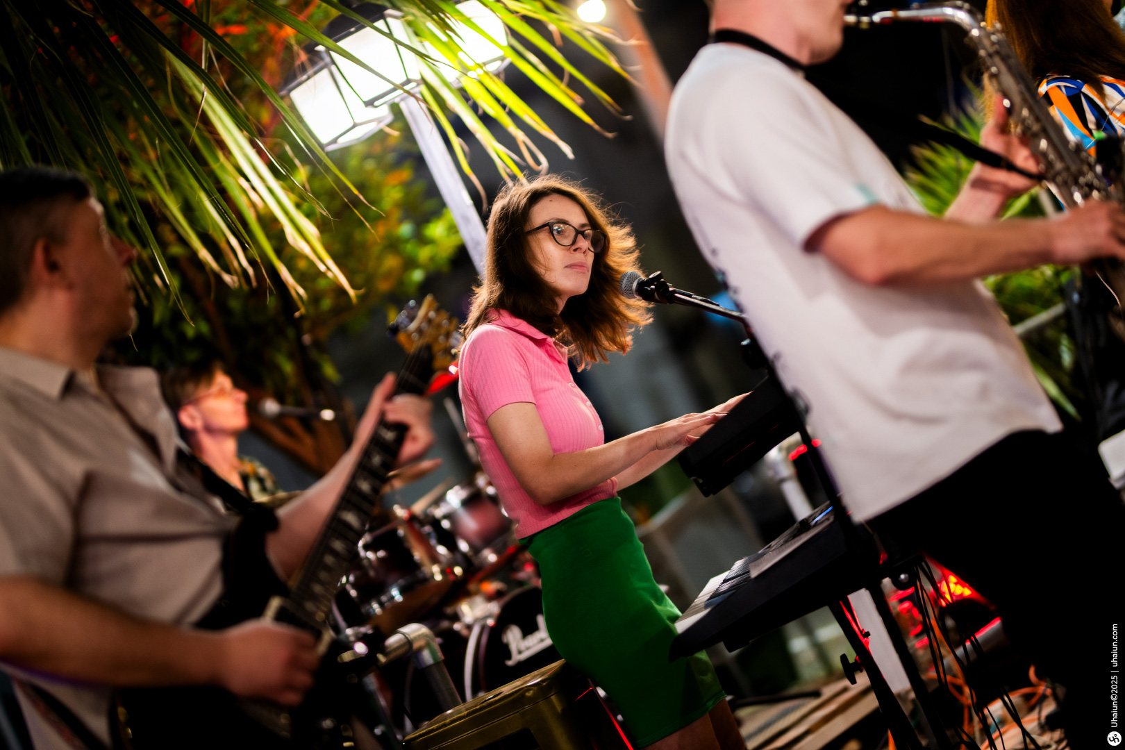 Band performing lively outdoor music event night
