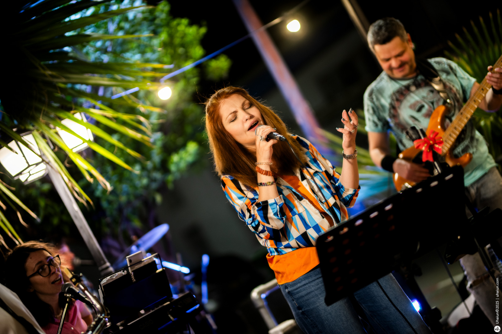 Live band performance at outdoor evening venue