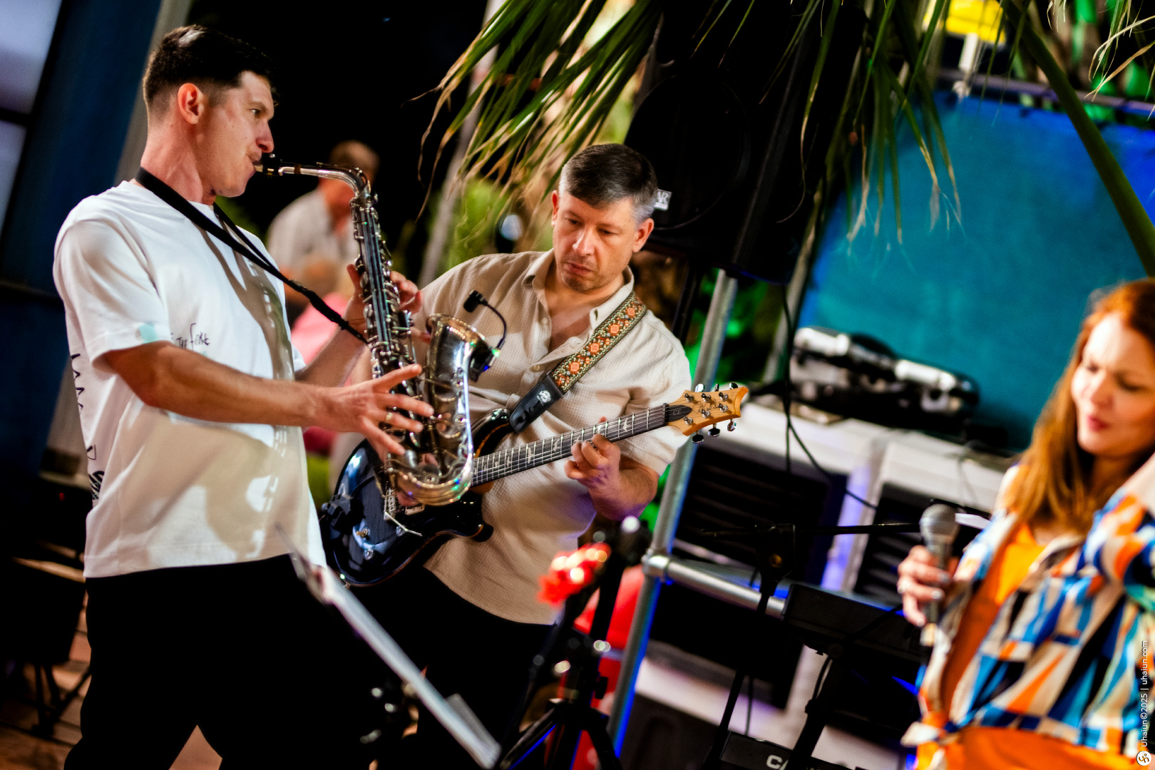 Musicians performing live music at outdoor event
