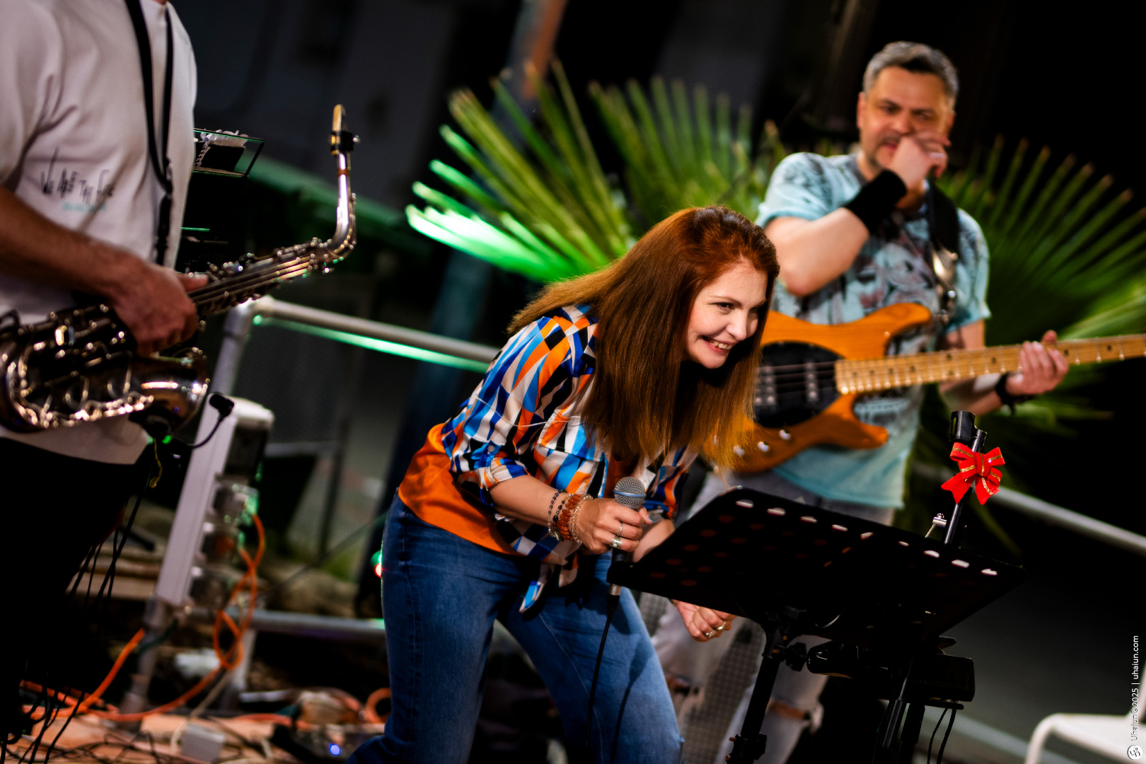 Band performing live music at outdoor event