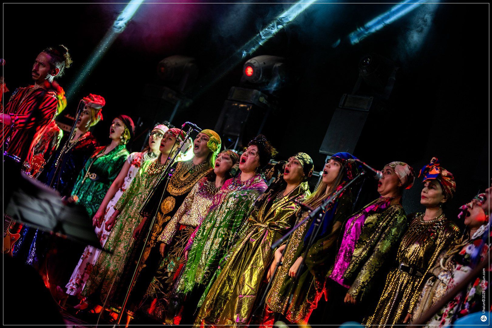Group of singers performing on stage together