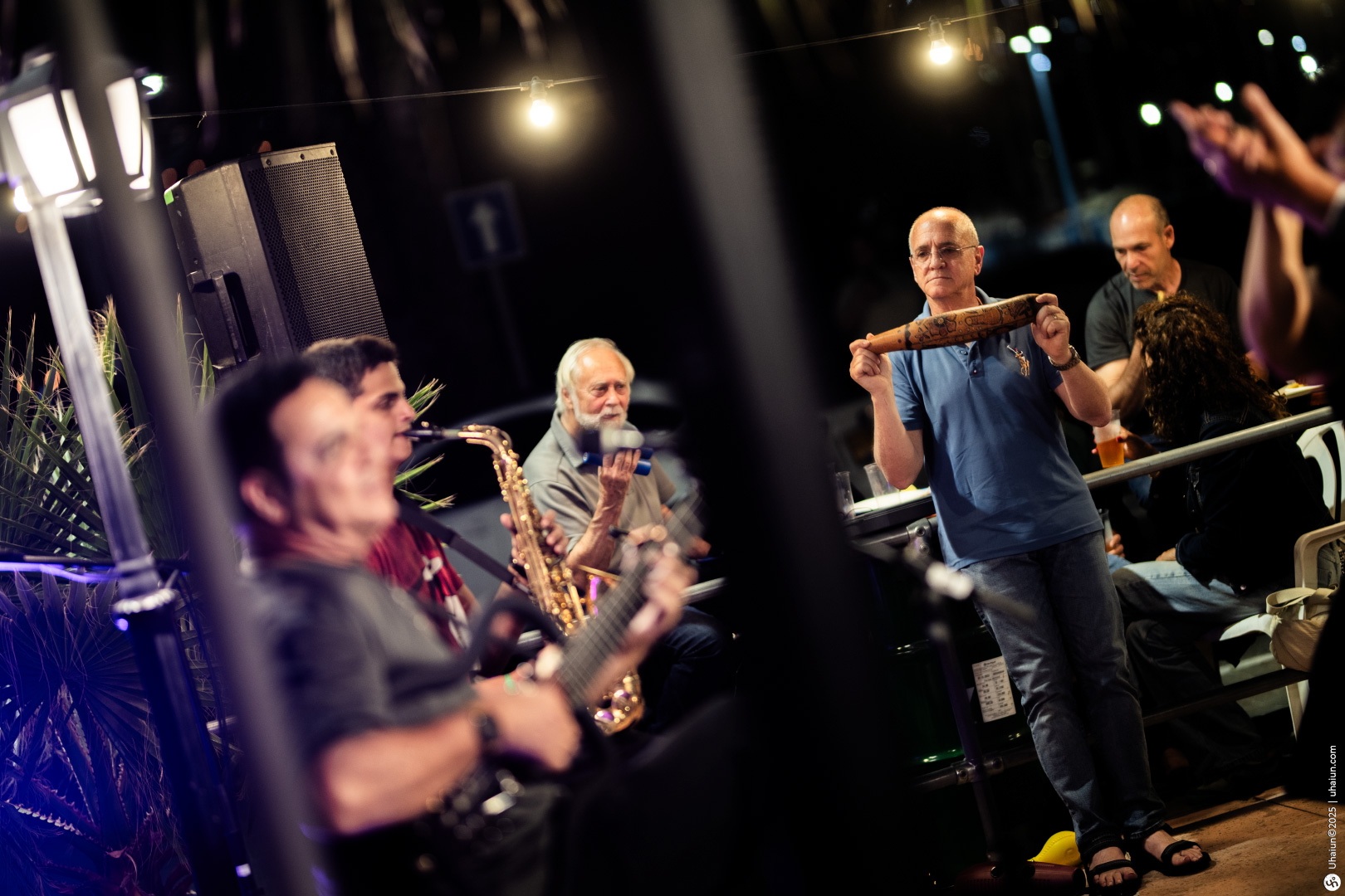 Live band performing outdoors at night event