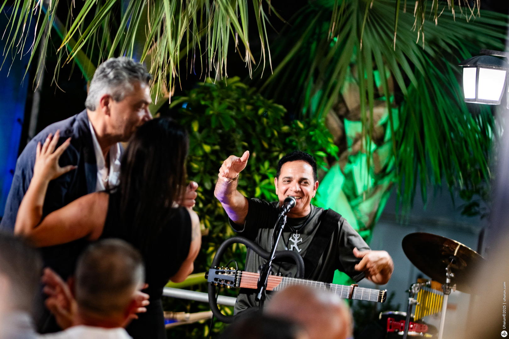 Musician performing lively outdoor concert event