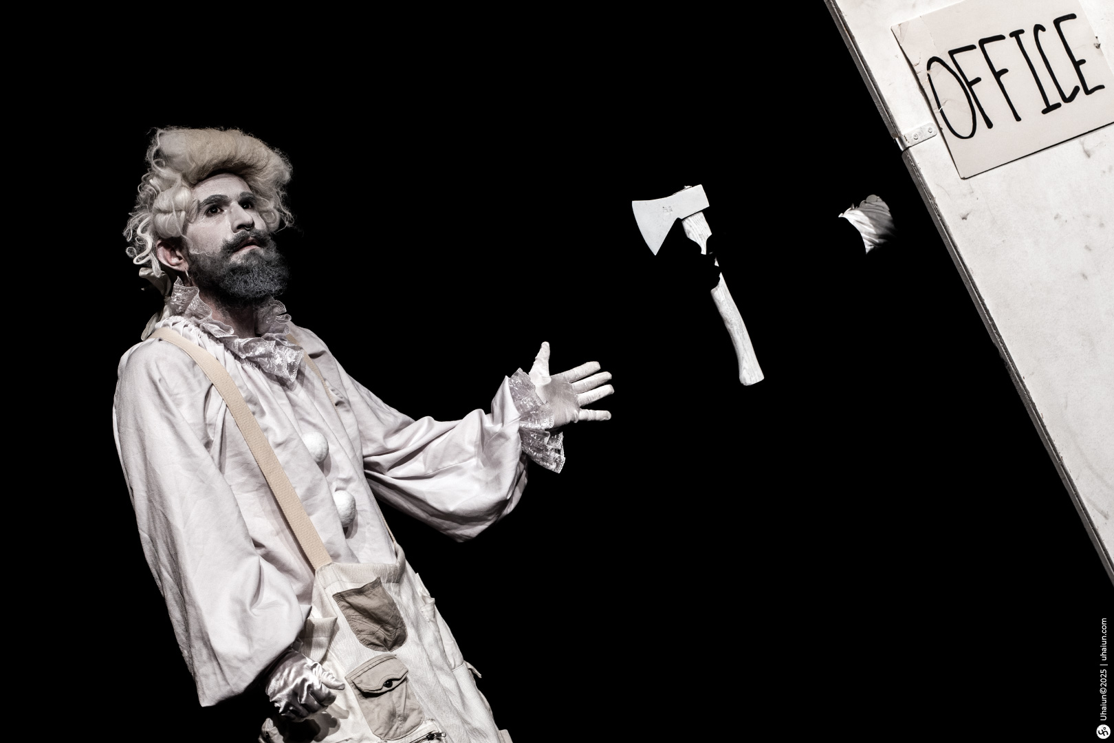 Performer in vintage costume near office door