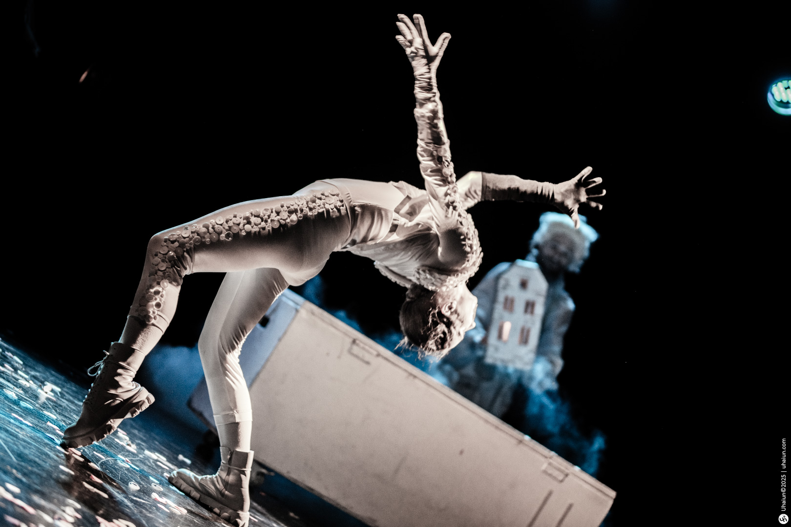 Contemporary dancer performing dramatic back arch pose