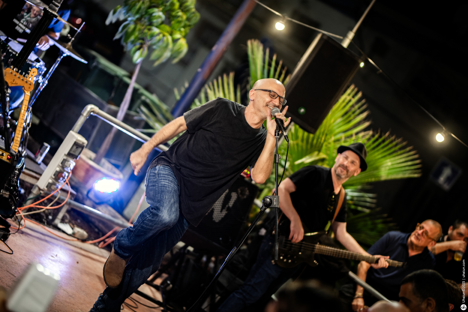 Live band performing at night outdoor concert