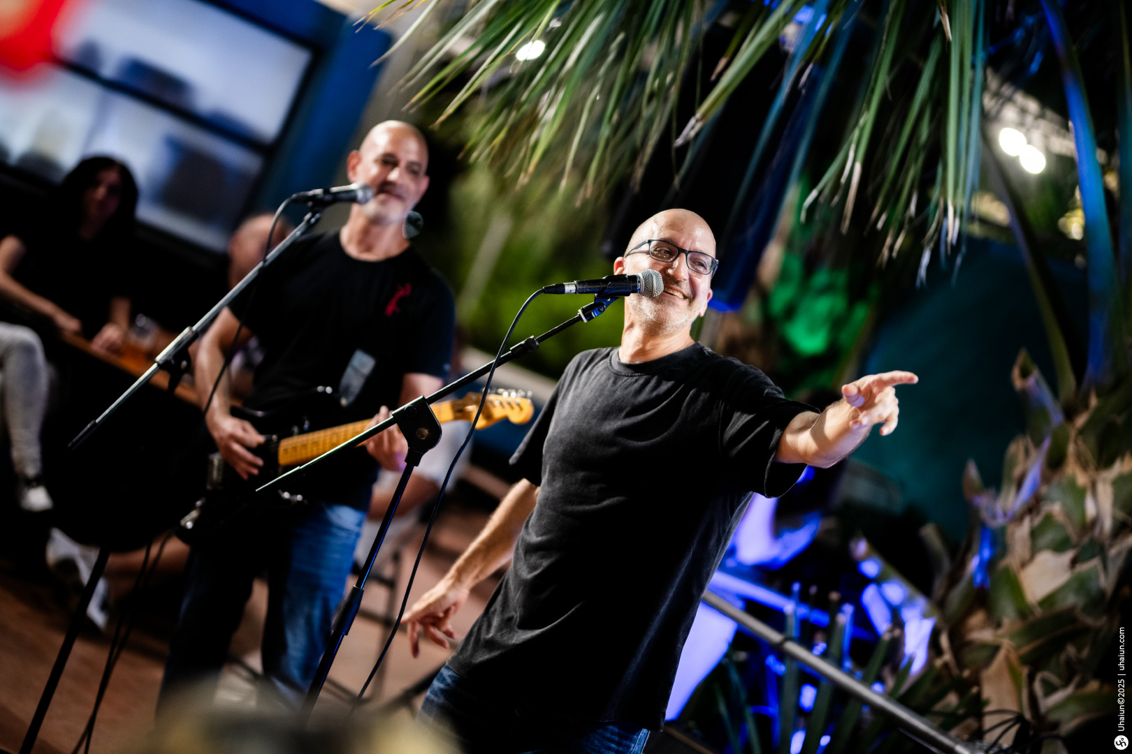 Musicians performing live on stage at event