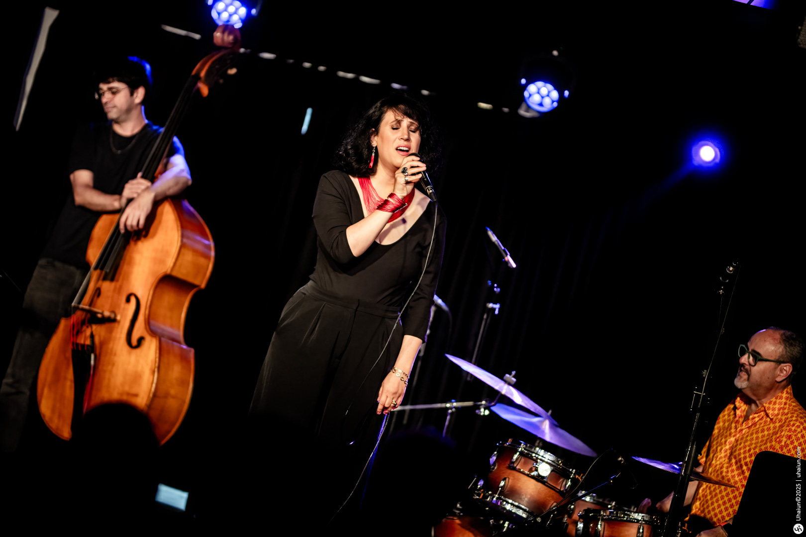 Jazz band performing live on stage passionately