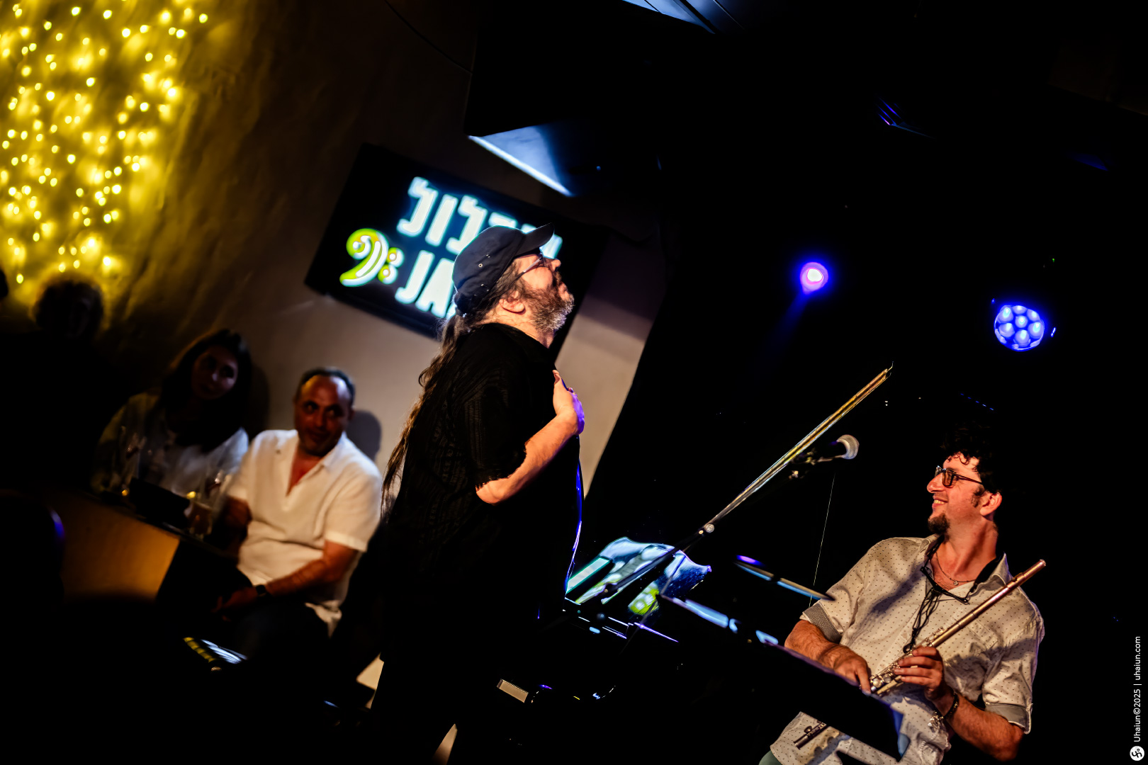 Live jazz performance with musicians and audience