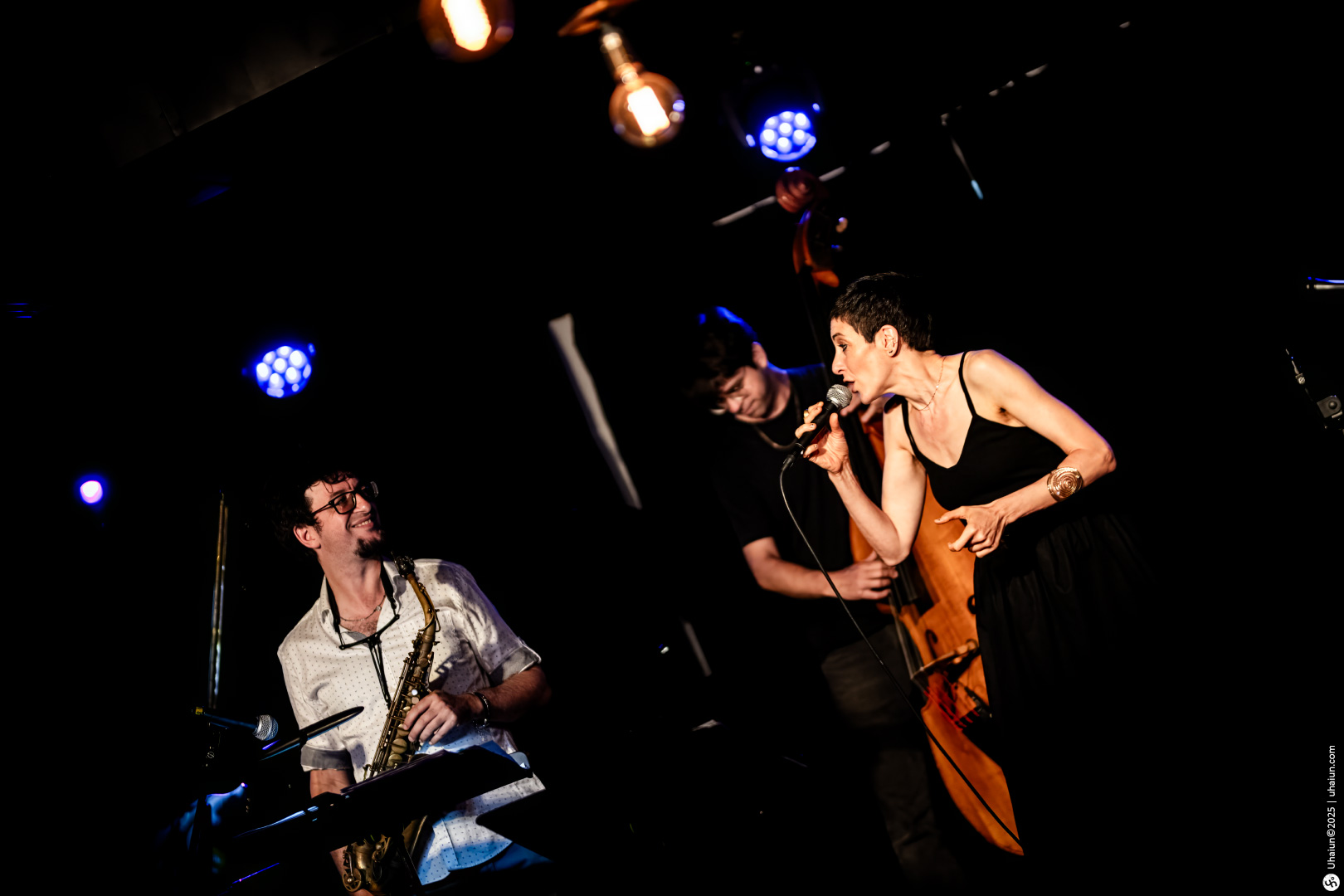 Jazz band performing live on stage passionately