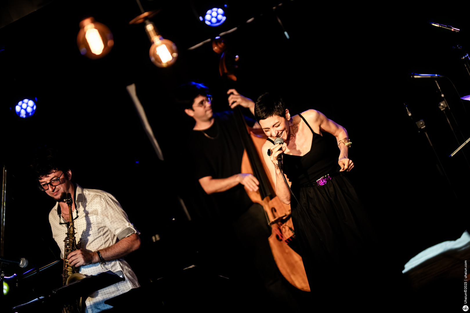 Musicians performing live jazz music on stage