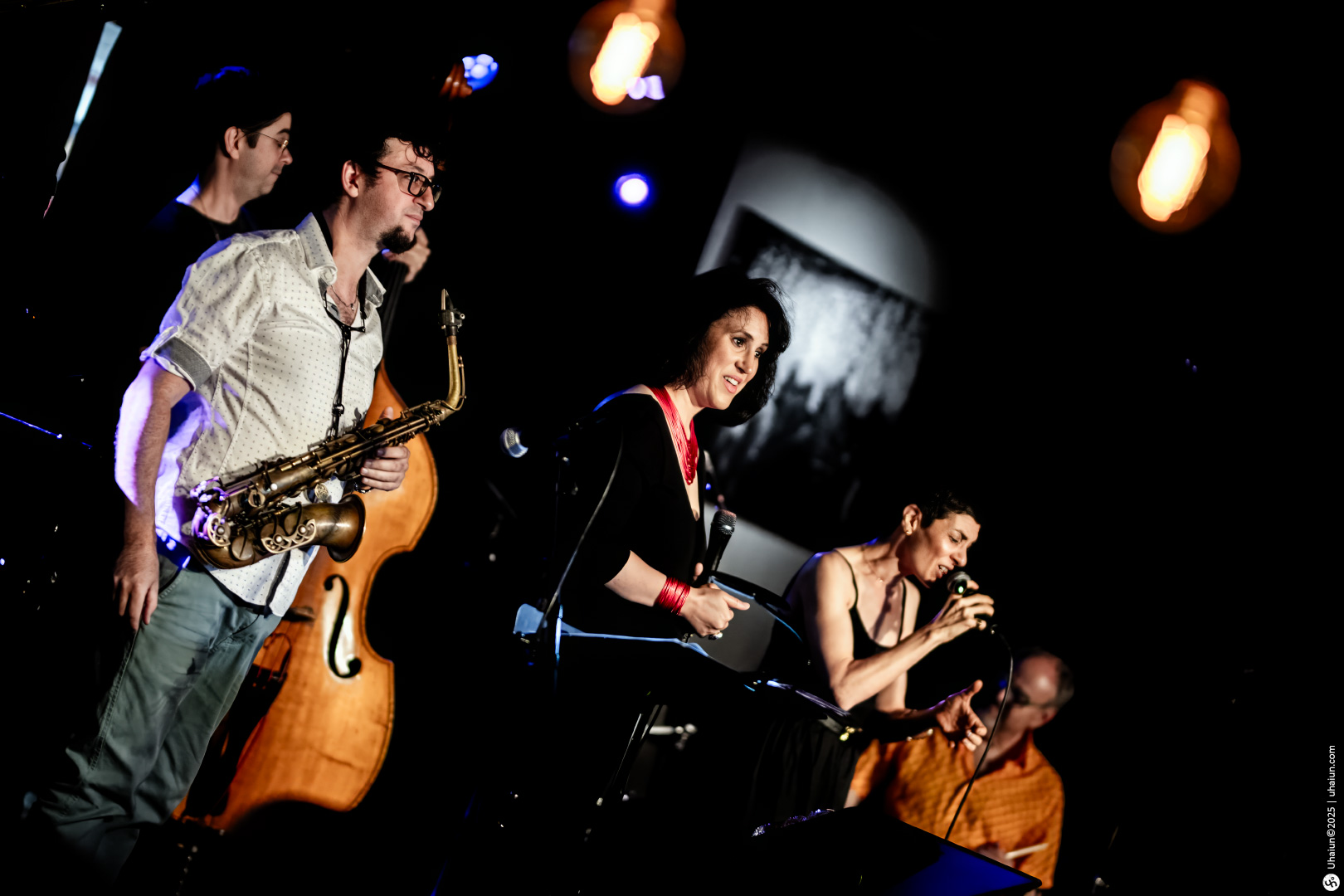 Jazz band performing live on dimly lit stage