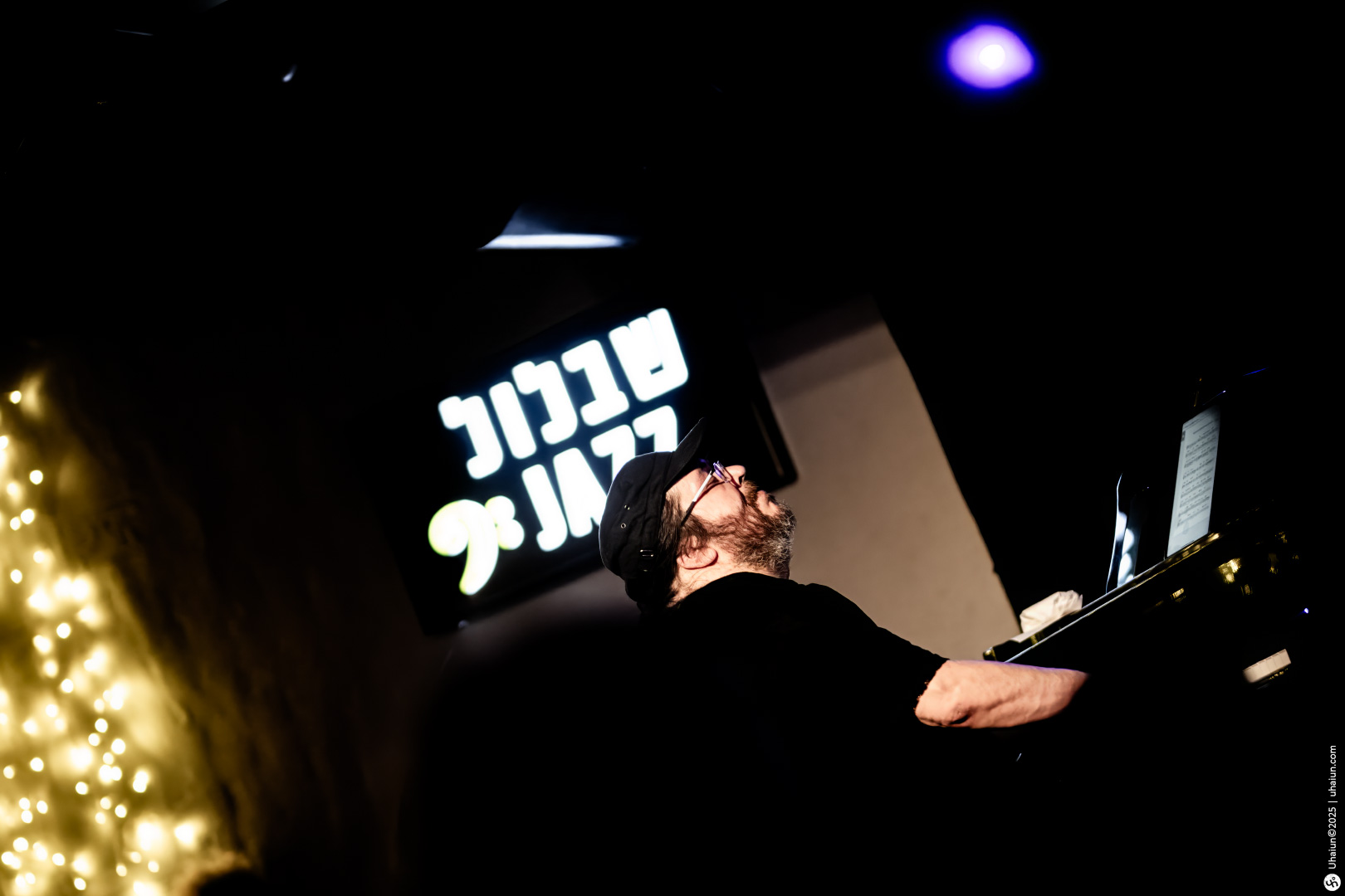 Musician performing live at intimate jazz venue