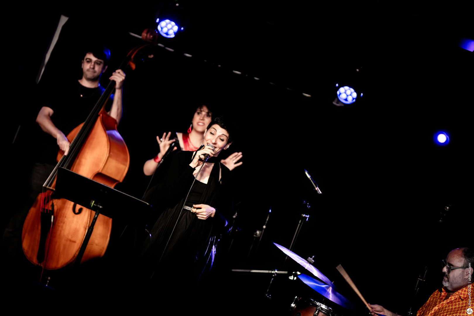 Live jazz performance with musicians on stage