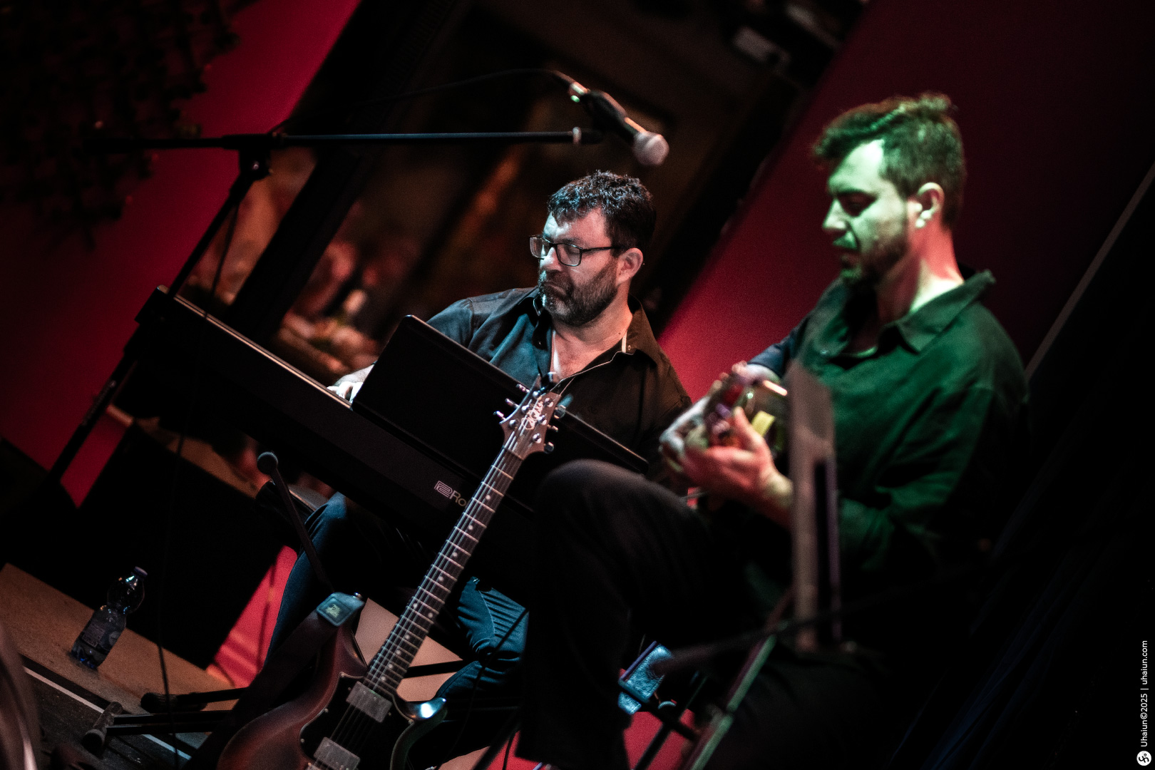 Musicians performing on stage with instruments