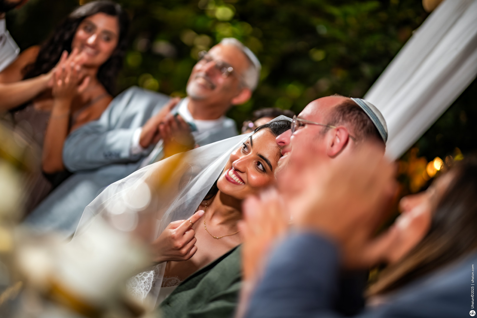 Bride and groom smiling during wedding ceremony