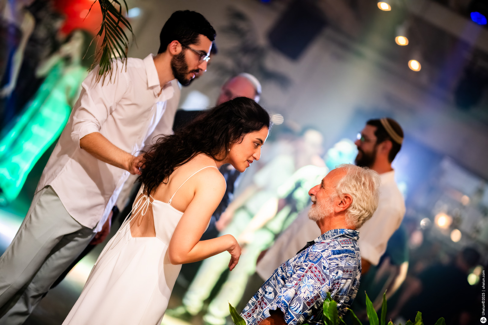 People socializing at a lively event gathering
