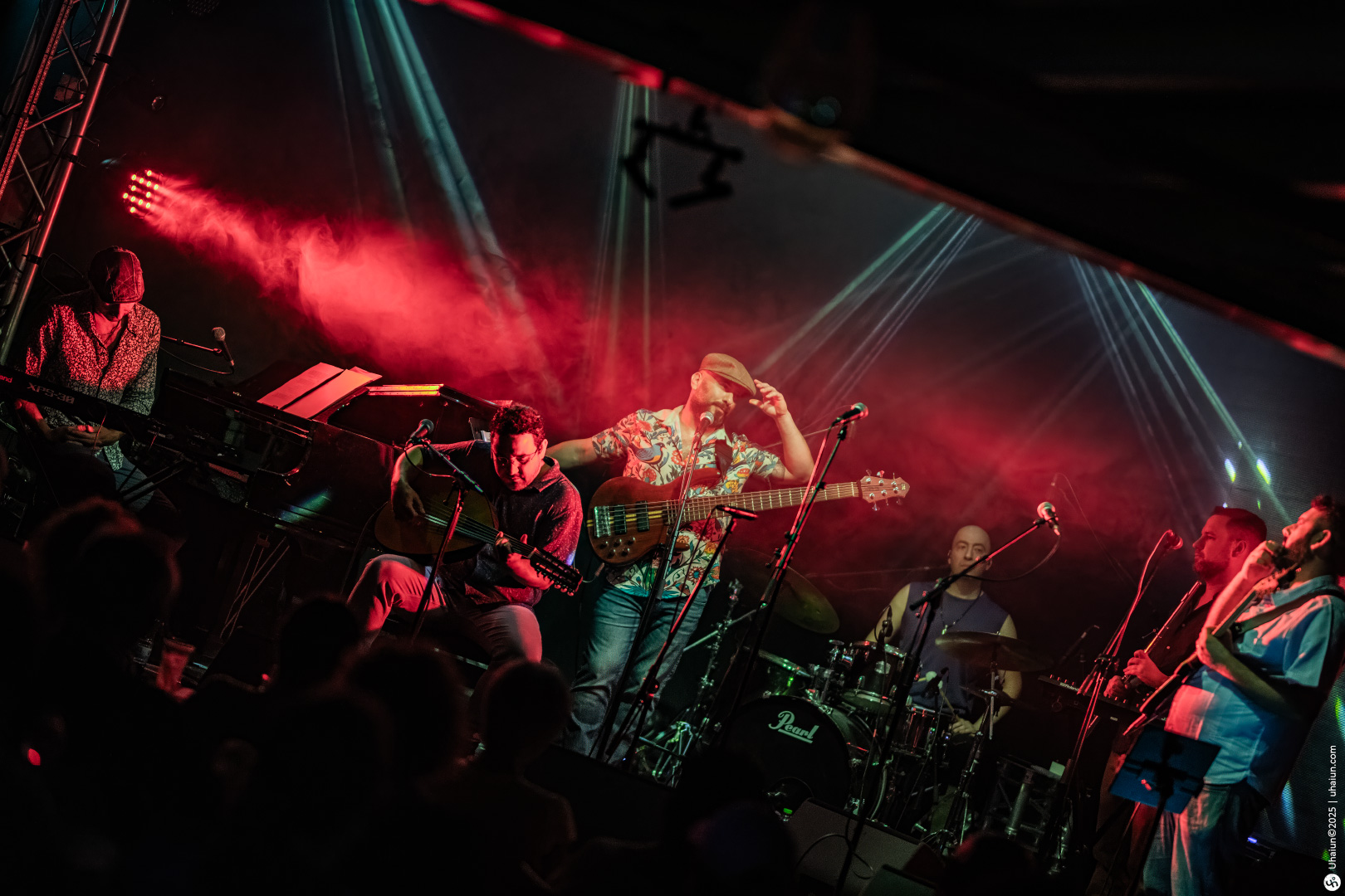 Live band performing with vibrant stage lighting