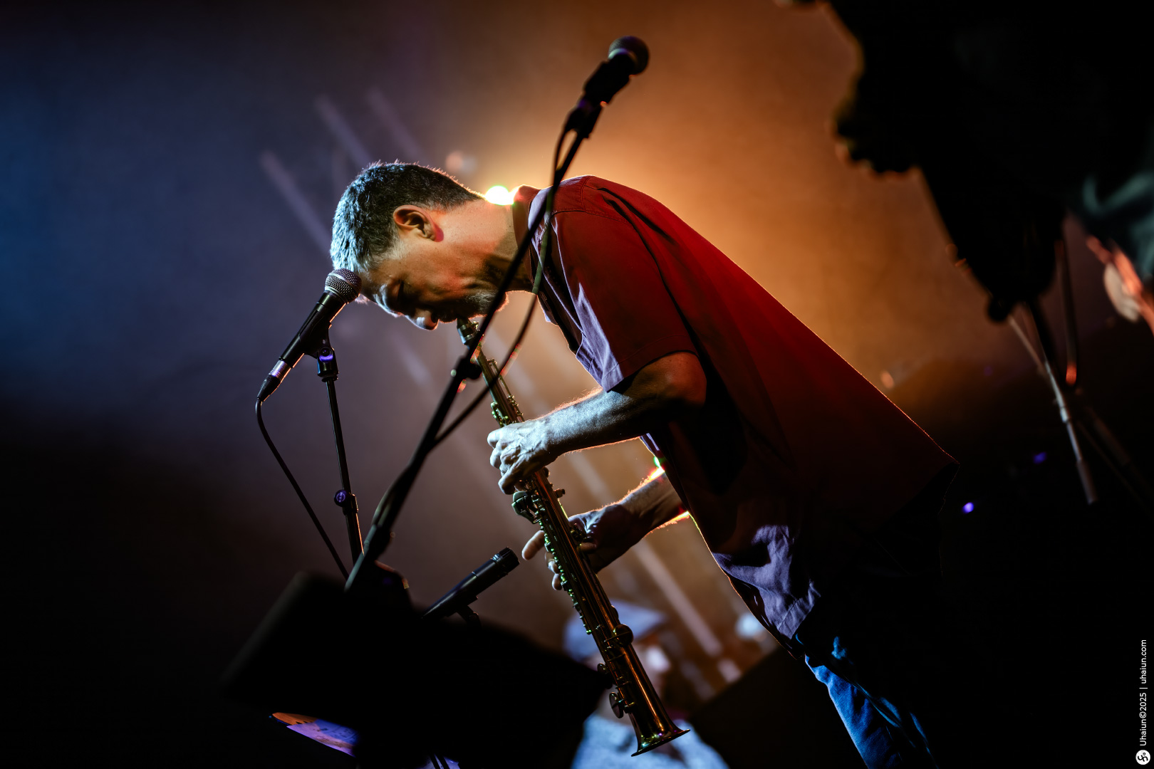 Musician playing trumpet during live performance