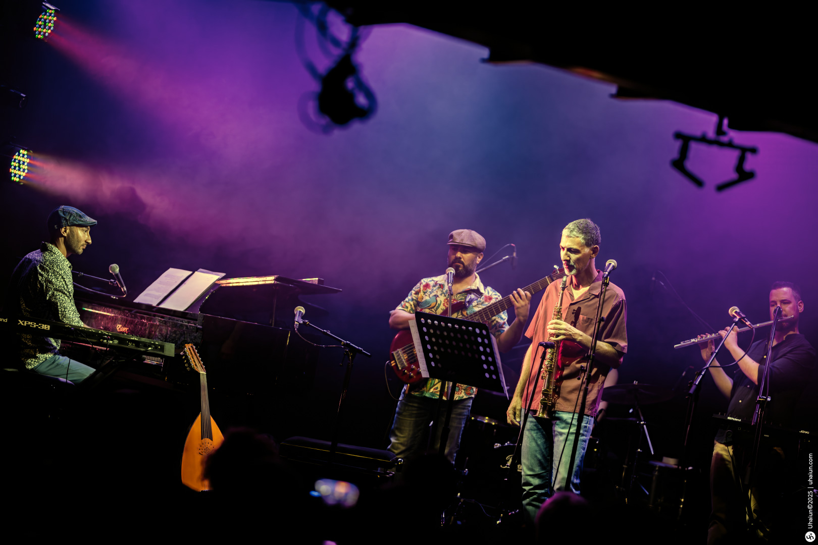 Live jazz band performing on stage with instruments